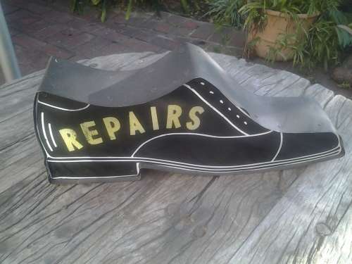 vintage shoe repair sign